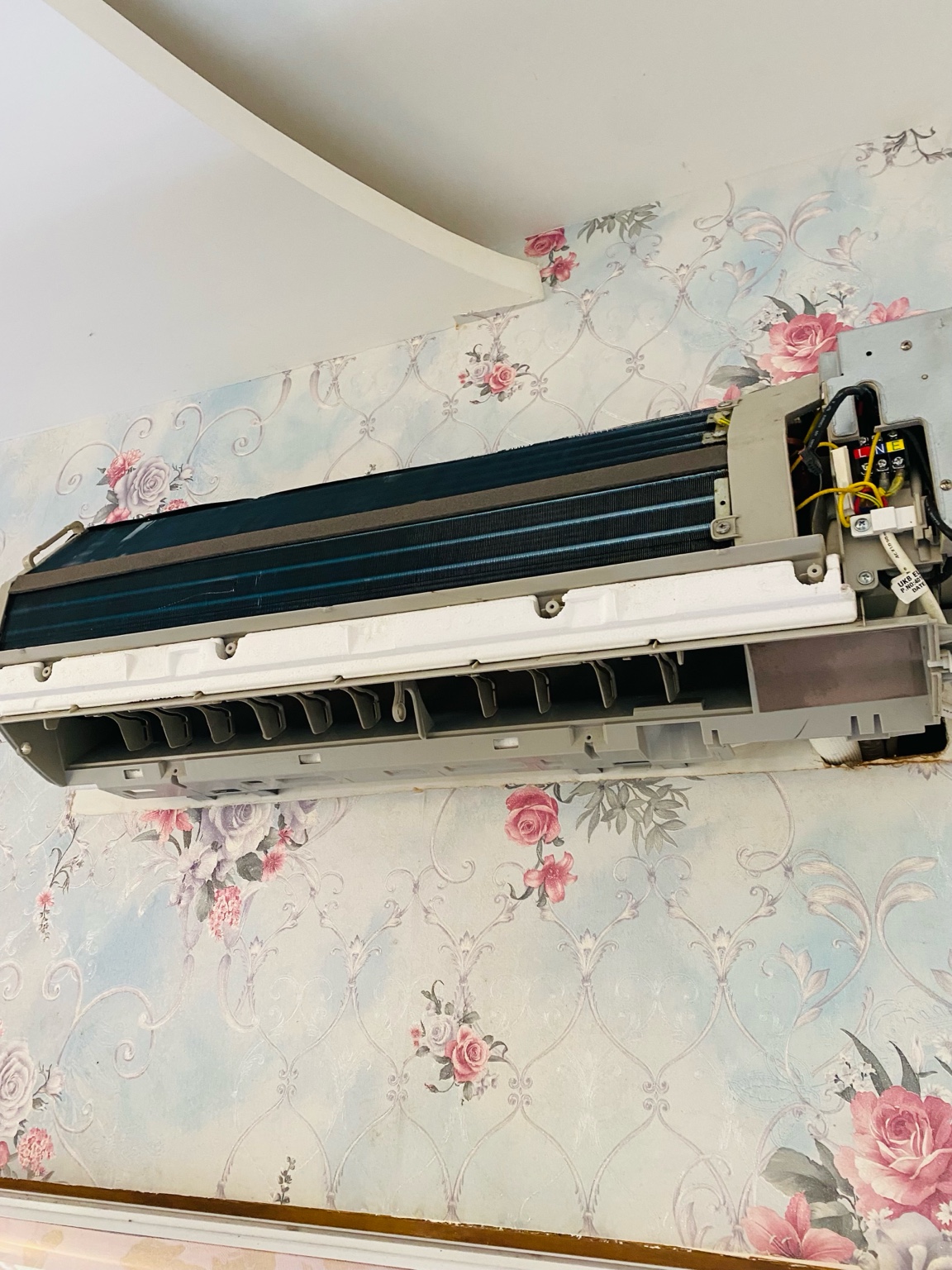 Technician working on AC unit